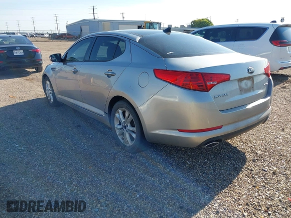 2013 Kia Optima EX with VIN 5XXGN4A76DG096109, listed as a IAAI auction lot 42509049 with 168,270 mi miles and . Bid and sale history available at DreamBid. Image 3.