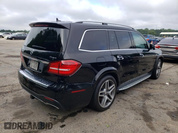 2017 Mercedes-Benz GLS with VIN 4JGDF7DE1HA857668, listed as a Copart auction lot 57278323 with 128,492 mi miles. Bid and sale history available at carsss.com. Image 3.