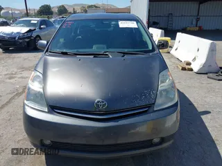 2007 Toyota Prius z VIN JTDKB20UX73217307, wystawiony jako IAAI lot #42225740 z przebiegiem 196 251 mil mil oraz . Historia ofert i sprzedaży dostępna na DreamBid. Obrazek 12.