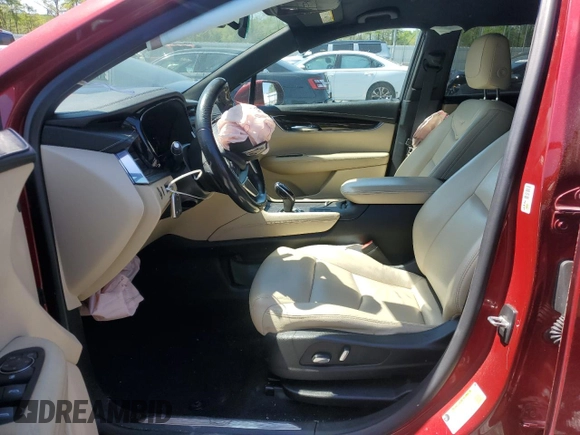 2018 Cadillac XT5 FWD with VIN 1GYKNARS1JZ205595, listed as a Copart auction lot 52428565 with 106,927 mi miles and Salvage title. Bid and sale history available at DreamBid. Image 7.