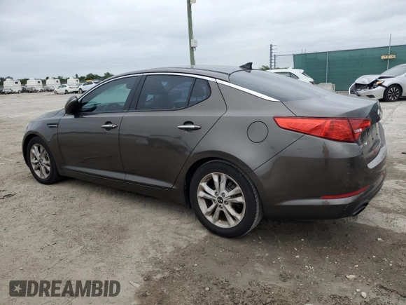 2011 Kia Optima EX with VIN KNAGN4A65B5139487, listed as a Copart auction lot 76731764 with Not Provided miles and Salvage Title. Bid and sale history available at carsss.com. Image 2.