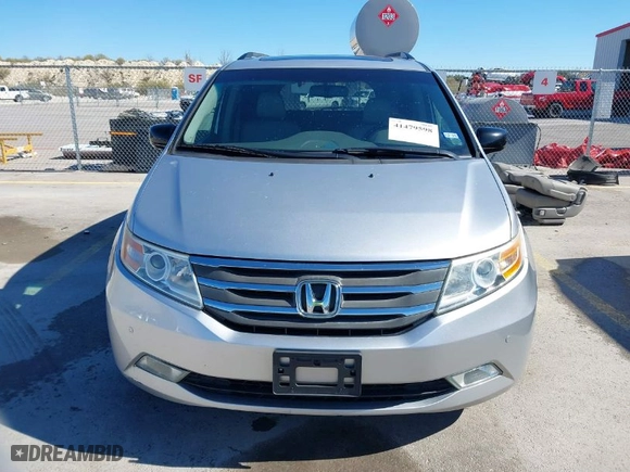 2012 Honda Odyssey Touring with VIN 5FNRL5H9XCB095283, listed as a IAAI auction lot 41479598 with NaN miles. Bid and sale history available at carsss.com. Image 13.