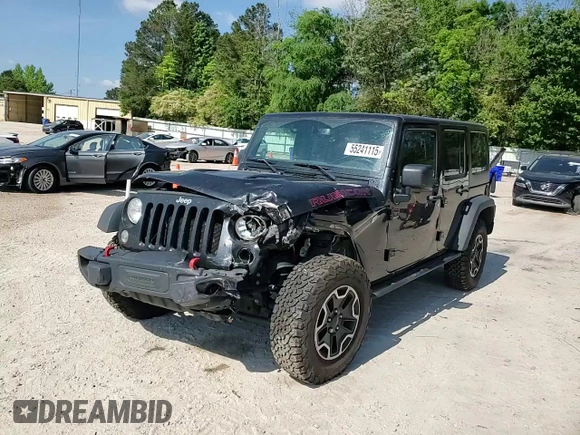 2016 Jeep Wrangler Unlimited Rubicon Hard Rock z VIN 1C4BJWFG6GL125252, wystawiony jako Copart lot #55241115 z przebiegiem 193 554 mil mil oraz Szkoda całkowita • Salvage title. Historia ofert i sprzedaży dostępna na DreamBid. Obrazek 13.