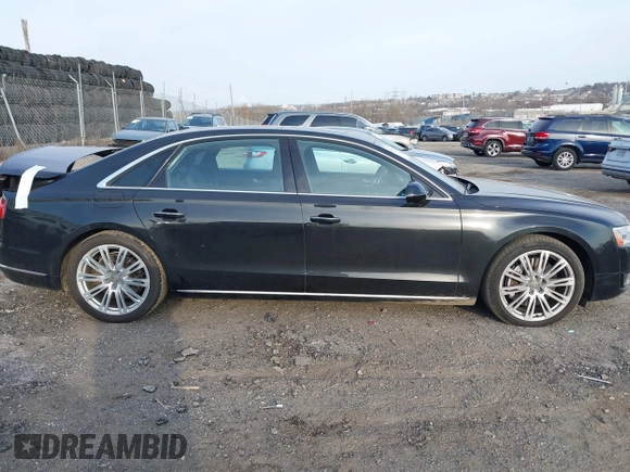 2015 Audi A8 3.0T with VIN WAU3GAFDXFN028244, listed as a IAAI auction lot 41791578 with 149,770 mi miles and . Bid and sale history available at DreamBid. Image 13.