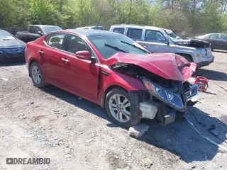2011 Kia Optima EX with VIN KNAGN4A74B5109910, listed as a IAAI auction lot 41856472 with 212,227 mi miles. Bid and sale history available at carsss.com. Image 1.