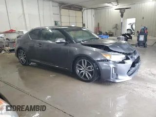 2015 Scion tC with VIN JTKJF5C70FJ002254, listed as a Copart auction lot 53077385 with 117,221 mi miles and Salvage Title. Bid and sale history available at carsss.com. Image 4.