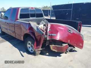 2003 Ford F-150 XL with VIN 2FTRX17233CA07991, listed as a IAAI auction lot 41649340 with 1 mi miles. Bid and sale history available at carsss.com. Image 6.
