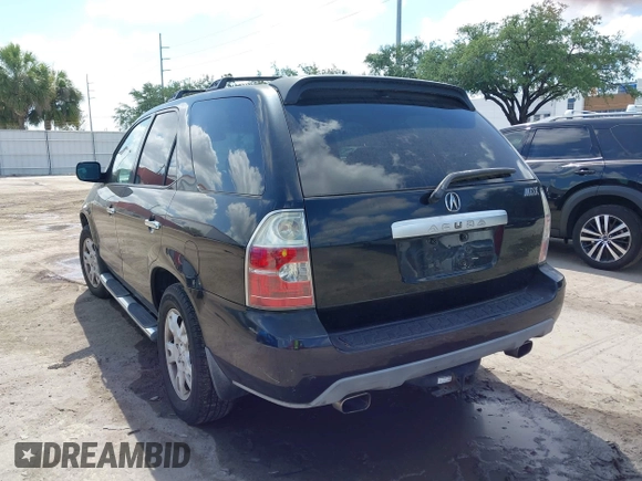 2006 Acura MDX Touring w/Navi with VIN 2HNYD18886H530531, listed as a IAAI auction lot 42045364 with 174,528 mi miles. Bid and sale history available at carsss.com. Image 3.