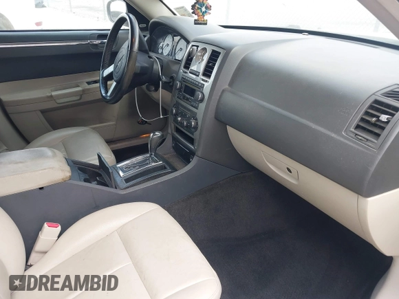 2006 Chrysler 300 Touring with VIN 2C3KA53G56H309497, listed as a IAAI auction lot 41792324 with 128,492 mi miles. Bid and sale history available at carsss.com. Image 5.