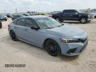 2022 Honda Civic Sport z VIN 2HGFE2F5XNH587113, wystawiony jako Copart lot #51333825 z przebiegiem 26 276 mil mil oraz Czysty tytuł • Clean title. Historia ofert i sprzedaży dostępna na DreamBid. Obrazek 4.