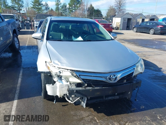 2014 Toyota Camry L with VIN 4T1BF1FK4EU338230, listed as a IAAI auction lot 41797002 with 162,611 mi miles. Bid and sale history available at carsss.com. Image 12.