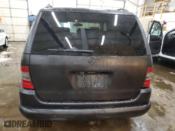 1999 Mercedes-Benz M-Class with VIN 4JGAB54E3XA101177, listed as a Copart auction lot 78703184 with 236,957 mi miles and Salvage Title. Bid and sale history available at carsss.com. Image 6.