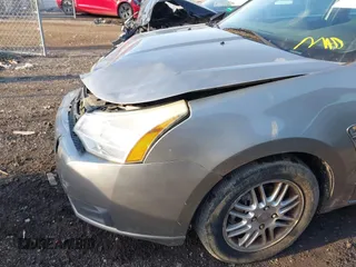 2008 Ford Focus SE with VIN 1FAHP35N98W165970, listed as a IAAI auction lot 42028598 with 242,004 mi miles and . Bid and sale history available at carsss.com. Image 6.
