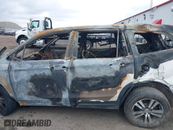 2017 Honda Pilot EX-L with VIN 5FNYF6H51HB052836, listed as a IAAI auction lot 41682052 with Not Provided miles and . Bid and sale history available at DreamBid. Image 13.