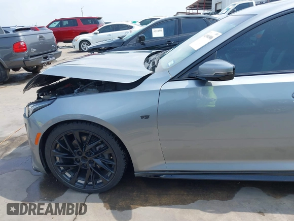 2023 Cadillac CT5 Sport z VIN 1G6DP5RK7P0113696, wystawiony jako IAAI lot #41904906 z przebiegiem 89 191 mil mil oraz . Historia ofert i sprzedaży dostępna na DreamBid. Obrazek 21.