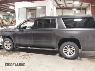 2018 Chevrolet Suburban LT z VIN 1GNSKHKC7JR173463, wystawiony jako IAAI lot #41640353 z przebiegiem Nie podano mil oraz . Historia ofert i sprzedaży dostępna na DreamBid. Obrazek 14.