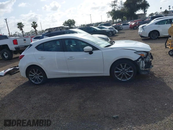 2018 Mazda 3 Touring with VIN 3MZBN1L31JM225108, listed as a IAAI auction lot 41959304 with 74,933 mi miles. Bid and sale history available at carsss.com. Image 14.