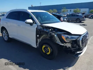 2022 Audi Q3 S line Premium z VIN WA1DECF32N1148121, wystawiony jako IAAI lot #42304046 z przebiegiem 19 547 mil mil oraz . Historia ofert i sprzedaży dostępna na DreamBid. Obrazek 1.