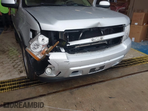 2010 Chevrolet Tahoe LT with VIN 1GNMCBE35AR114622, listed as a IAAI auction lot 41974795 with 248,109 mi miles and . Bid and sale history available at DreamBid. Image 6.
