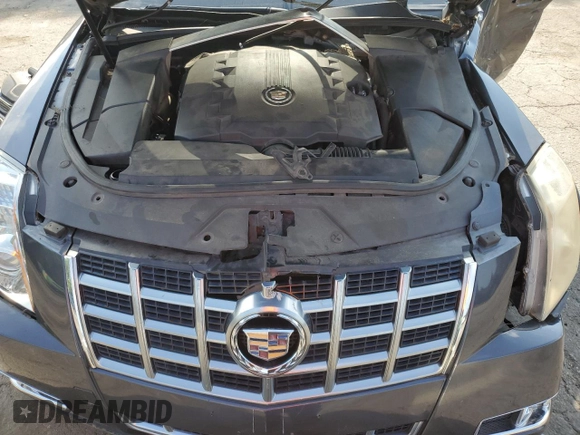 2013 Cadillac CTS Performance z VIN 1G6DK5E3XD0104466, wystawiony jako Copart lot #57479555 z przebiegiem Nie podano mil oraz Szkoda całkowita • Salvage title. Historia ofert i sprzedaży dostępna na DreamBid. Obrazek 11.