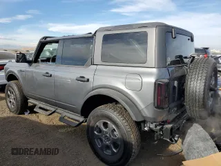 2024 Ford Bronco Big Bend z VIN 1FMDE7BH9RLA85832, wystawiony jako Copart lot #86171994 z przebiegiem 1 196 mil mil oraz Szkoda całkowita • Salvage title. Historia ofert i sprzedaży dostępna na DreamBid. Obrazek 2.