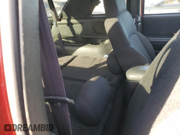 2004 Chevrolet Blazer LS z VIN 1GNCT18X34K141674, wystawiony jako Copart lot #85500954 z przebiegiem Nie podano mil oraz Czysty tytuł • Clean title. Historia ofert i sprzedaży dostępna na DreamBid. Obrazek 10.