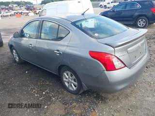2014 Nissan Versa SV with VIN 3N1CN7APXEL862867, listed as a IAAI auction lot 42447084 with 202,413 mi miles and . Bid and sale history available at DreamBid. Image 3.