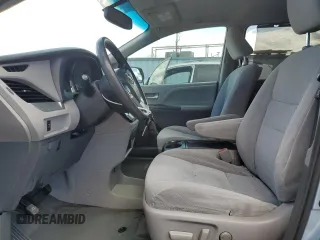2015 Toyota Sienna LE AAS with VIN 5TDKK3DCXFS577990, listed as a Copart auction lot 56608525 with 93,323 mi miles and Salvage title. Bid and sale history available at DreamBid. Image 7.