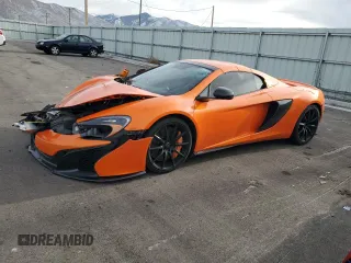2015 McLaren 650S z VIN SBM11FAA8FW004578, wystawiony jako Copart lot #82216824 z przebiegiem 19 372 mil mil oraz Szkody całkowita. Historia ofert i sprzedaży dostępna na DreamBid. Obrazek 1.