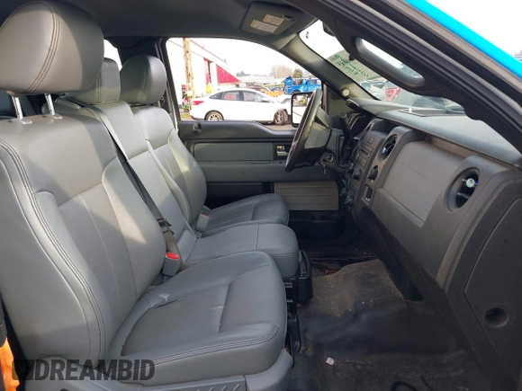 2014 Ford F-150 XL with VIN 1FTFX1CF4EKG53325, listed as a IAAI auction lot 41060015 with 216,554 mi miles. Bid and sale history available at carsss.com. Image 5.