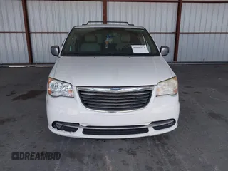 2014 Chrysler Town & Country Touring-L with VIN 2C4RC1CG2ER312444, listed as a IAAI auction lot 42050774 with 124,010 mi miles. Bid and sale history available at carsss.com. Image 12.