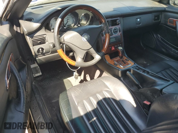 2004 Mercedes-Benz SLK-Class with VIN WDBKK65F24F306069, listed as a Copart auction lot 68791864 with 99,835 mi miles and Salvage Title. Bid and sale history available at carsss.com. Image 8.