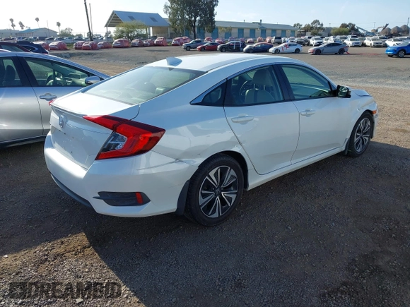 2018 Honda Civic EX-L with VIN JHMFC1F76JX001429, listed as a IAAI auction lot 42110222 with 135,487 mi miles and . Bid and sale history available at DreamBid. Image 4.
