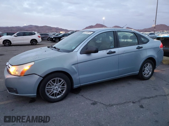 2009 Ford Focus SE with VIN 1FAHP35NX9W224459, listed as a Copart auction lot 86253964 with 120,544 mi miles and Salvage Title. Bid and sale history available at carsss.com. Image 1.