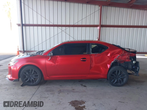 2016 Scion tC z VIN JTKJF5C77GJ023409, wystawiony jako IAAI lot #41538972 z przebiegiem 121 283 mil mil oraz . Historia ofert i sprzedaży dostępna na DreamBid. Obrazek 14.