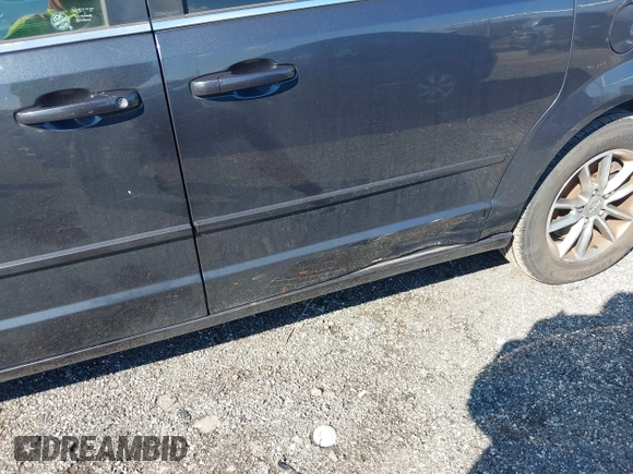 2014 Dodge Grand Caravan SXT with VIN 2C4RDGCG3ER339491, listed as a IAAI auction lot 41744826 with 146,757 mi miles and . Bid and sale history available at DreamBid. Image 6.