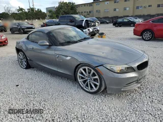 2011 BMW Z4 sDrive35i with VIN WBALM7C55BE382692, listed as a Copart auction lot 84460034 with 112,322 mi miles and Salvage Title. Bid and sale history available at carsss.com. Image 4.