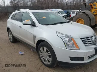 2014 Cadillac SRX Luxury Collection z VIN 3GYFNEE35ES681424, wystawiony jako IAAI lot #41854969 z przebiegiem 135 163 mil mil oraz . Historia ofert i sprzedaży dostępna na DreamBid. Obrazek 1.