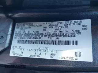 2015 Ford Escape SE with VIN 1FMCU0GXXFUB99852, listed as a IAAI auction lot 41704198 with 84,735 mi miles. Bid and sale history available at carsss.com. Image 9.