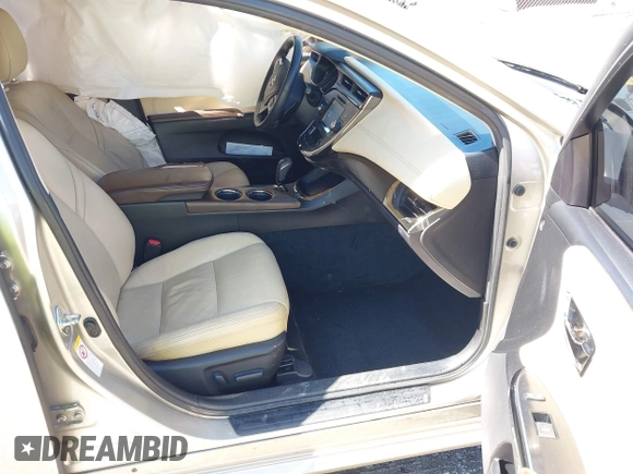 2018 Toyota Avalon XLE with VIN 4T1BK1EB9JU283488, listed as a IAAI auction lot 41777239 with 97,893 mi miles and . Bid and sale history available at DreamBid. Image 5.