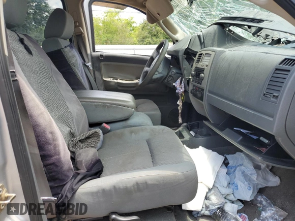 2005 Dodge Dakota SLT with VIN 1D7HE48K15S133160, listed as a Copart auction lot 70200384 with 233,215 mi miles and Salvage Title. Bid and sale history available at DreamBid. Image 7.