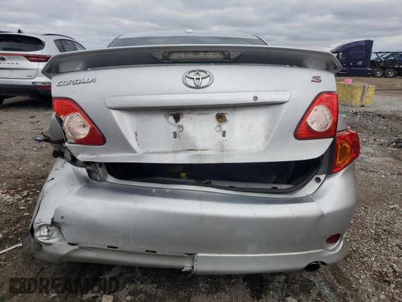 2010 Toyota Corolla with VIN 1NXBU4EE1AZ377581, listed as a Copart auction lot 52578805 with 242,776 mi miles and Salvage Title. Bid and sale history available at DreamBid. Image 6.