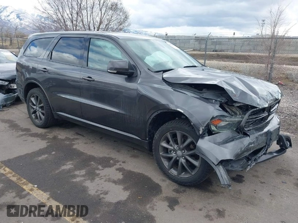 2017 Dodge Durango GT with VIN 1C4RDJDGXHC878859, listed as a IAAI auction lot 41724901 with 141,126 mi miles and . Bid and sale history available at carsss.com. Image 1.