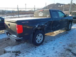 2014 Chevrolet Silverado 1500 LT with VIN 1GCVKREC3EZ168855, listed as a IAAI auction lot 41373740 with 150,659 mi miles and . Bid and sale history available at DreamBid. Image 4.