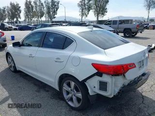 2014 Acura ILX with VIN 19VDE1F34EE011312, listed as a IAAI auction lot 41813693 with 107,032 mi miles. Bid and sale history available at carsss.com. Image 3.