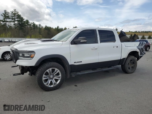 2020 Ram 1500 Rebel with VIN 1C6SRFLM1LN230872, listed as a Copart auction lot 55671585 with 97,202 mi miles and Salvage title. Bid and sale history available at DreamBid. Image 1.