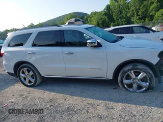 2013 Dodge Durango Citadel with VIN 1C4SDJET6DC652552, listed as a IAAI auction lot 42602746 with 163,602 mi miles and . Bid and sale history available at DreamBid. Image 13.