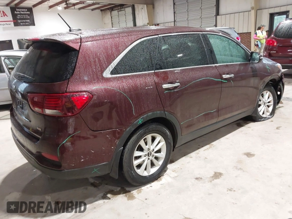 2019 Kia Sorento L with VIN 5XYPG4A34KG548624, listed as a IAAI auction lot 42020831 with 124,226 mi miles. Bid and sale history available at carsss.com. Image 4.