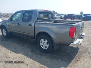 2005 Nissan Frontier LE with VIN 1N6AD07W35C438405, listed as a IAAI auction lot 42469804 with 128,472 mi miles and . Bid and sale history available at DreamBid. Image 3.