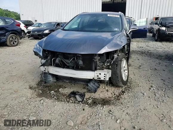 2016 Lexus RX 350 z VIN 2T2BZMCA7GC003824, wystawiony jako Copart lot #61991015 z przebiegiem 113 583 mil mil oraz Szkoda całkowita • Salvage title. Historia ofert i sprzedaży dostępna na DreamBid. Obrazek 14.